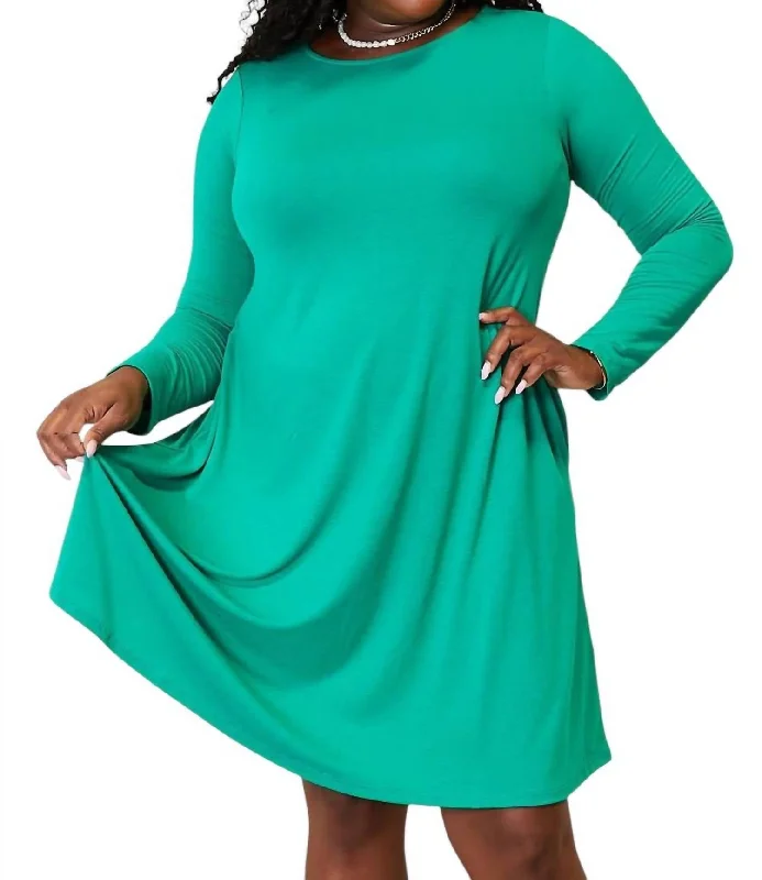 ladies-trumpet-dress-flowy-skirt-Full Size Long Sleeve Flare Dress With Pockets In Turquoise