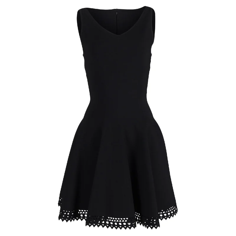 ladies-trumpet-dress-button-detail-Alaïa Knit Cut-Out Detail Flared Dress in Black Wool